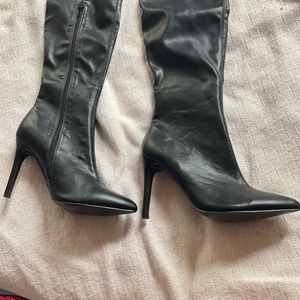 Thigh high black boots